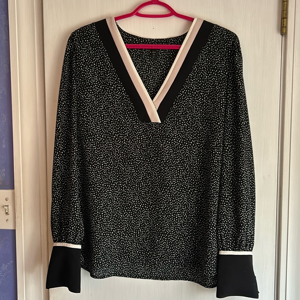 Black and white polkadotted blouse
